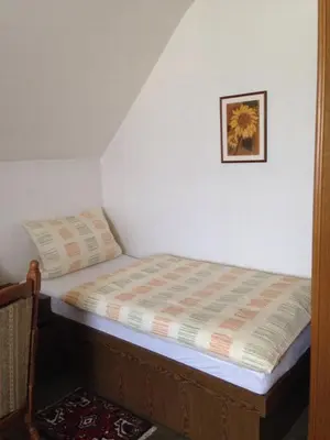 Ein Bett oder Betten in einem Zimmer der Unterkunft Guesthouse AirMinis