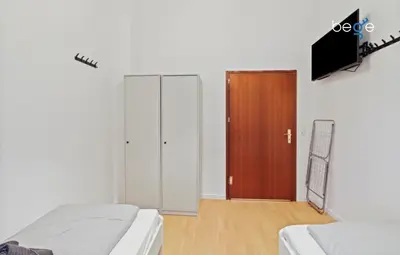 Ein Bett oder Betten in einem Zimmer der Unterkunft BEGE APARTMENTS WorkLounge