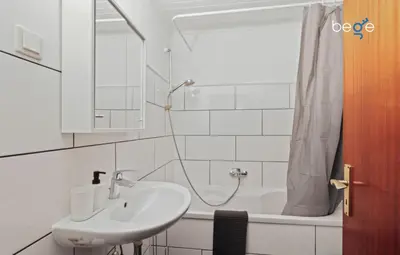 Ein Badezimmer in der Unterkunft BEGE APARTMENTS WorkLounge