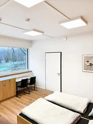 Ein Bett oder Betten in einem Zimmer der Unterkunft Erlebniswelt Resort Apartment 5