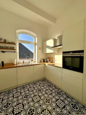 Küche/Küchenzeile in der Unterkunft Stilvolle Altbauwohnung mit Charme