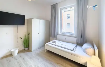 Ein Bett oder Betten in einem Zimmer der Unterkunft BEGE APARTMENTS SmartWork Lodge