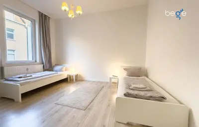 Ein Bett oder Betten in einem Zimmer der Unterkunft BEGE APARTMENTS SmartWork Lodge