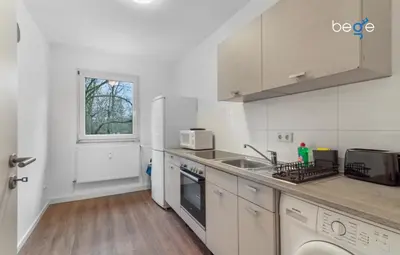 Küche/Küchenzeile in der Unterkunft BEGE APARTMENTS Corporate Nest