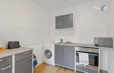 Küche/Küchenzeile in der Unterkunft BEGE APARTMENTS Corporate Nest