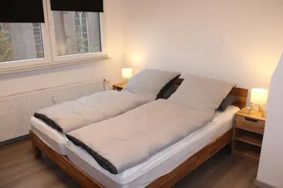 Ein Bett oder Betten in einem Zimmer der Unterkunft FeWo Oberhausen-Styrum