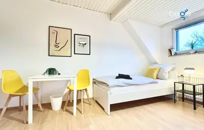 Ein Bett oder Betten in einem Zimmer der Unterkunft BEGE APARTMENTS WorkLodge