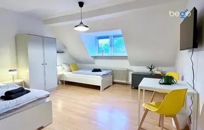 Ein Bett oder Betten in einem Zimmer der Unterkunft BEGE APARTMENTS WorkLodge