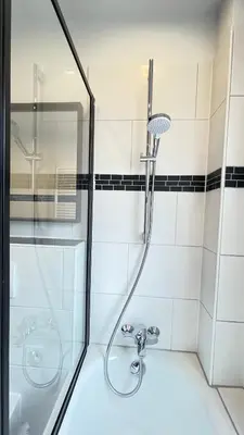 Ein Badezimmer in der Unterkunft Home Apartments Four