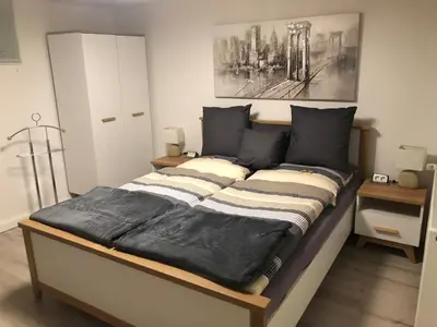 Ein Bett oder Betten in einem Zimmer der Unterkunft FeWo Marina