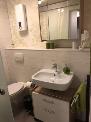 Ein Badezimmer in der Unterkunft FeWo Marina