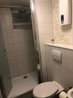 Ein Badezimmer in der Unterkunft FeWo Marina