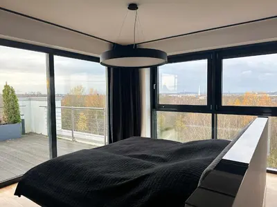 Ein Bett oder Betten in einem Zimmer der Unterkunft Infinity Apartment Essen