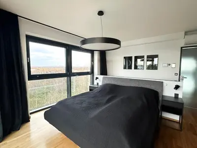 Ein Bett oder Betten in einem Zimmer der Unterkunft Infinity Apartment Essen