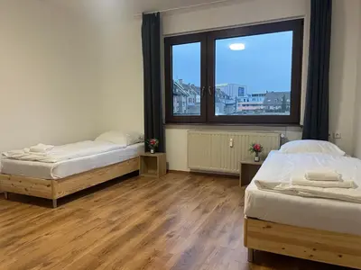 Ein Bett oder Betten in einem Zimmer der Unterkunft T&K Apartments - Duisburg - 1-3 Zimmer Apartments