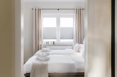 Ein Bett oder Betten in einem Zimmer der Unterkunft Design Apartment - Küche - Komfort - Zentral