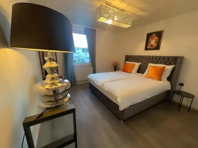 Ein Bett oder Betten in einem Zimmer der Unterkunft Wohngut City Appartement 4 für 1-4 Personen inklusive Parkplatz