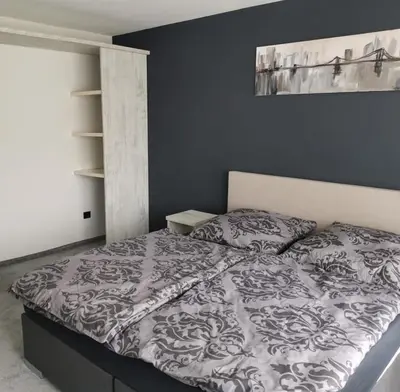 Ein Bett oder Betten in einem Zimmer der Unterkunft Bentheimer Hof