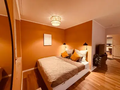 Ein Bett oder Betten in einem Zimmer der Unterkunft Modernes Design-Apartment in Hünxe