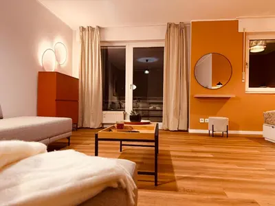 Ein Sitzbereich in der Unterkunft Modernes Design-Apartment in Hünxe