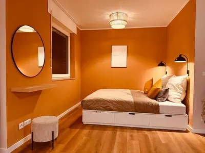 Ein Bett oder Betten in einem Zimmer der Unterkunft Modernes Design-Apartment in Hünxe