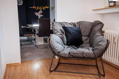 Ein Sitzbereich in der Unterkunft bold & black - balcony - Netflix - Wifi - 5 Person