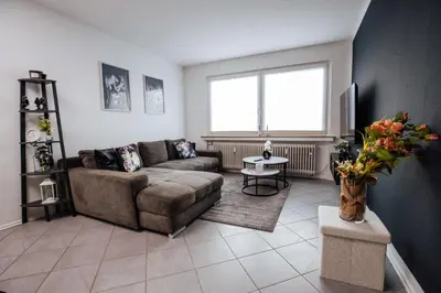 Ein Sitzbereich in der Unterkunft bold & black - balcony - Netflix - Wifi - 5 Person