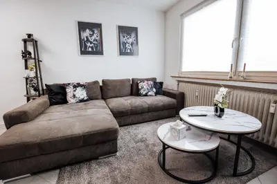 Ein Sitzbereich in der Unterkunft bold & black - balcony - Netflix - Wifi - 5 Person