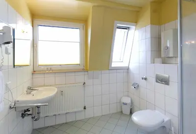 Ein Badezimmer in der Unterkunft Hotel Alte Fabrik