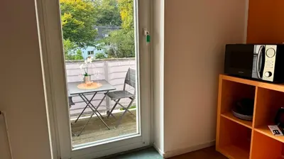 Ein Balkon oder eine Terrasse in der Unterkunft Frisch renovierte Ferienwohnung Abendrot für 2 Personen, zentral gelegen