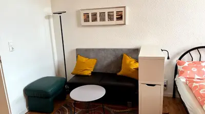 Ein Sitzbereich in der Unterkunft Frisch renovierte Ferienwohnung Abendrot für 2 Personen, zentral gelegen