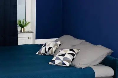 Ein Bett oder Betten in einem Zimmer der Unterkunft Modernes 2 Zimmer Apartment, 6 Personen, WIFI