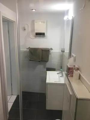 Ein Badezimmer in der Unterkunft Atrium