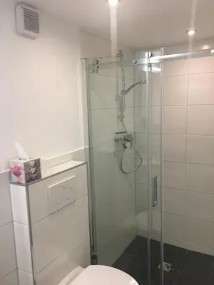 Ein Badezimmer in der Unterkunft Atrium