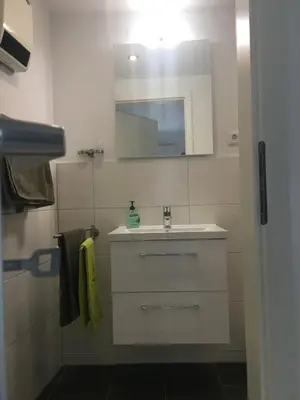 Ein Badezimmer in der Unterkunft Atrium