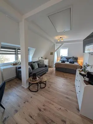 Ein Sitzbereich in der Unterkunft Villa Baumhaus Apartments