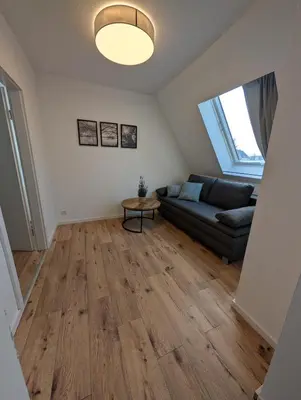 Ein Sitzbereich in der Unterkunft Villa Baumhaus Apartments