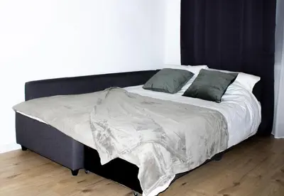 Ein Bett oder Betten in einem Zimmer der Unterkunft Cozy Apartment Wuppertal