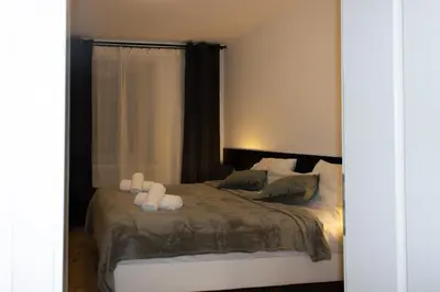 Ein Bett oder Betten in einem Zimmer der Unterkunft Cozy Apartment Wuppertal