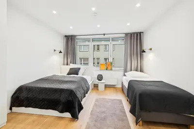 Ein Bett oder Betten in einem Zimmer der Unterkunft Schicker Wohntraum 9 Pers City, Lift, Parken