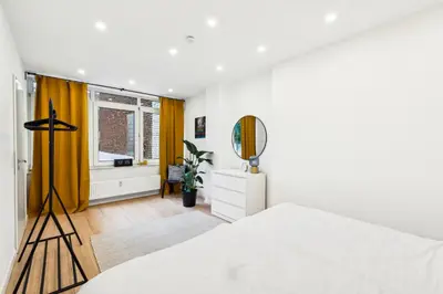 Ein Bett oder Betten in einem Zimmer der Unterkunft Schicker Wohntraum 9 Pers City, Lift, Parken