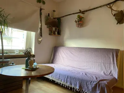 Ein Bett oder Betten in einem Zimmer der Unterkunft Gemütliche und mit Charme eingerichtete Wohnung