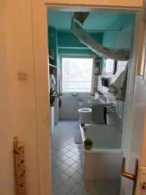 Ein Sitzbereich in der Unterkunft Gemütliche und mit Charme eingerichtete Wohnung