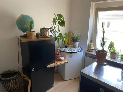 Küche/Küchenzeile in der Unterkunft Gemütliche und mit Charme eingerichtete Wohnung
