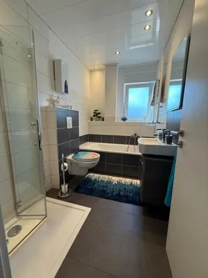 Ein Badezimmer in der Unterkunft Rene Deluxe Apartament 2 Zimmer in einer WG mit Gemeinschaftsküche
