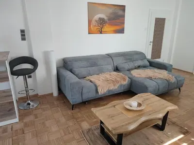 Ein Sitzbereich in der Unterkunft Rene Deluxe Apartament 2 Zimmer in einer WG mit Gemeinschaftsküche
