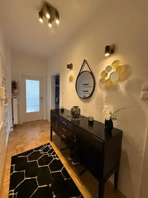 Ein Sitzbereich in der Unterkunft Rene Deluxe Apartament 2 Zimmer in einer WG mit Gemeinschaftsküche