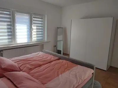 Ein Bett oder Betten in einem Zimmer der Unterkunft Rene Deluxe Apartament 2 Zimmer in einer WG mit Gemeinschaftsküche
