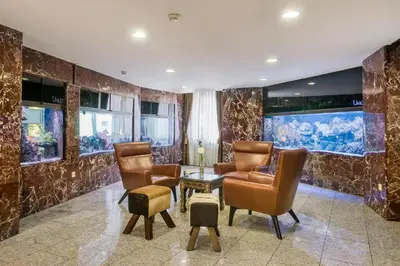 Ein Sitzbereich in der Unterkunft Hotel Unique Majestic