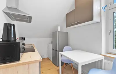 Küche/Küchenzeile in der Unterkunft BEGE APARTMENTS Work Life Lodge